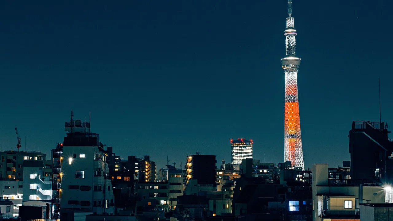 Tokyo Skytree rising above the city skyline at night